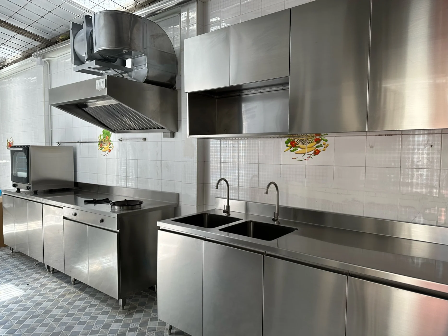 Stainless steel work areas within a commercial kitchen